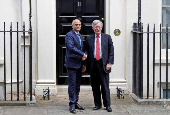 Image: Britain's Chancellor of the Exchequer Sajid Javid shakes hands with U.S. National Security Advisor John Bolton at Downing Street in London