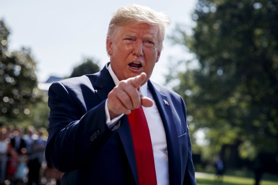 Image: President Donald Trump talks to reporters on the South Lawn of the White House on Aug. 9, 2019.