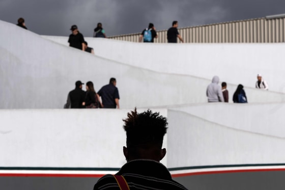 Image: An asylum seeker waits outside El Chaparral port of entry as he waits for his turn to present to U.S. border authorities to request asylum, in Tijuana, Baja California state, Mexico, on April 9, 2019.