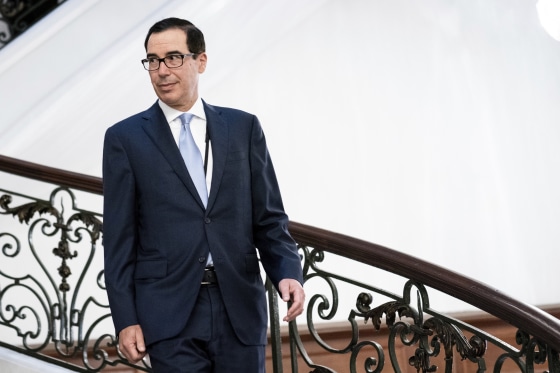 Image: Treasury Secretary Steven Mnuchin walks to a breakfast at the G7 Summit in Biarritz, France, on Aug. 25, 2019.