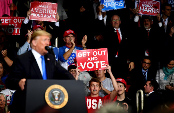 Image: President Donald Trump speaks to the crowd at a \"Make America Great Again\" rally outside of Charlotte, North Carolina, in 2018.