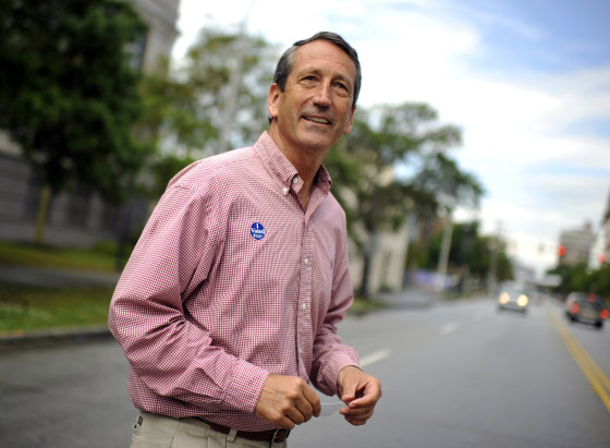 Image: Former Gov. Mark Sanford leaves a polling place in Charleston, S.C., in 2013.
