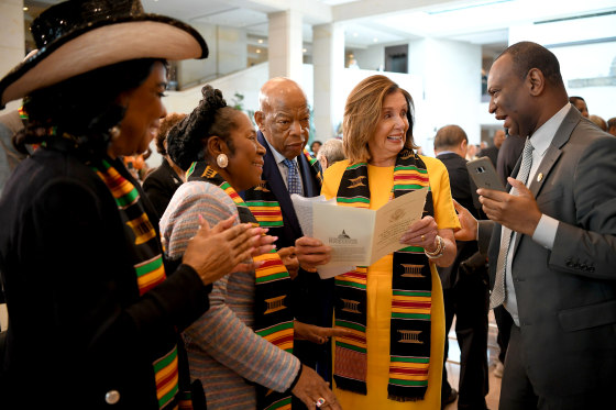 Image: Representatives Frederica Wilson, Sheila Jackson Lee, John Lewis and Speaker of the House Nancy Pelosi arrive for the Congressional Black Caucus ceremony commemorating the 400th anniversary of the forced arrival of enslaved Africans at the Capitol