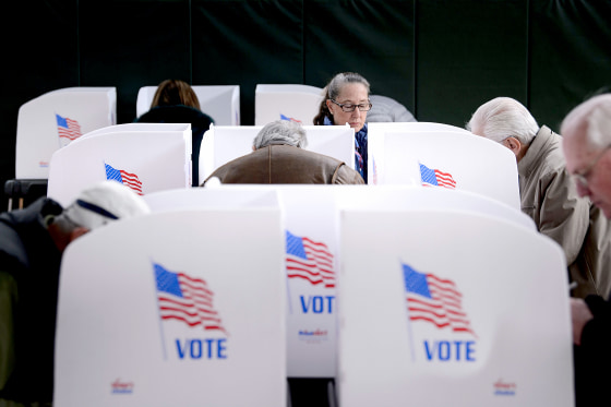 Image: People cast their ballots at a community center during early voting Oct. 25, 2018 in Potomac, Maryland, two weeks ahead of the key U.S. midterm polls.