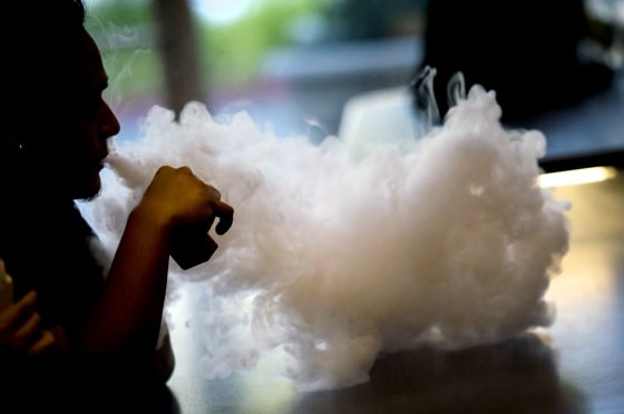 Image: A customer vapes at a vaping store in Sacramento, Calif., on June 28, 2018.
