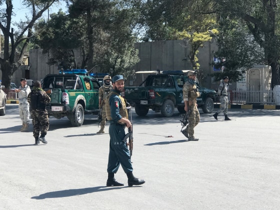Image: Afghan security forces keep watch at the site of a blast in Kabul