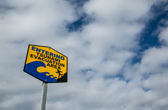 Image: A tsunami evacuation area sign is viewed near Lapakahi State Historical Park near Hawi on the Kohala Coast, Hawaii.