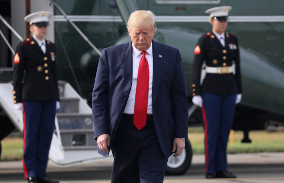Image: President Donald Trump prepares to speak to reporters before boarding Air Force One at Morristown Municipal Airport in Morristown