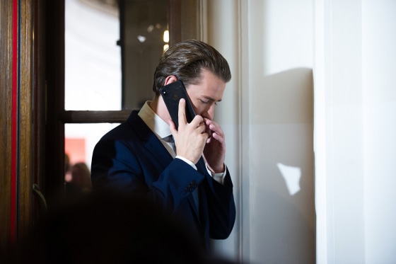 Image: Former Chancellor Sebastian Kurz of the Austrian People's Party (OeVP) talks on the phone at Hofburg before a television interview following elections to the National Council
