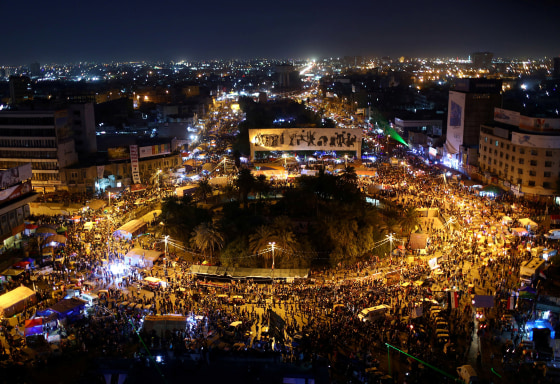 Image: Demonstrators take part during the ongoing anti-government protests in Tahrir square, Baghdad, Iraq