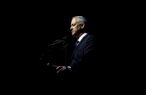 Image: Benny Gantz, head of Blue and White party, speaks during a rally commemorating the 24th anniversary of the assassination of Israeli Prime Minister Yitzhak Rabin, in Tel Aviv,