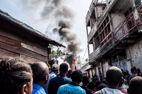 Image: Smoke rises from the scene after a small plane crashed in Goma, a city in the Democratic Republic of Congo, on Nov. 24, 2019.