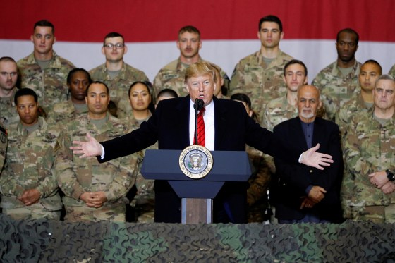 Image: President Donald Trump delivers speak to U.S. troops, with Afghanistan President Ashraf Ghani standing behind him, during an unannounced visit to Bagram Air Base on Thursday.