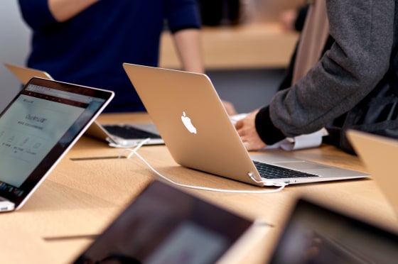 Image: Macbook laptops in an Apple store in China in 2016.