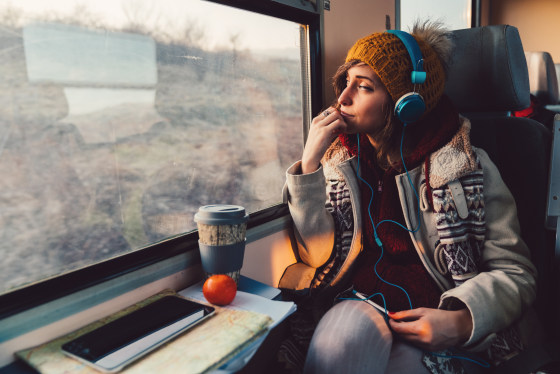 Traveler on a journey with train