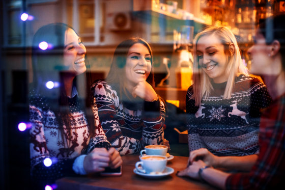 Girls laughing in cafe