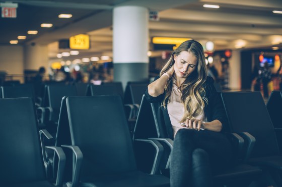 Image: Woman at airport waiting area
