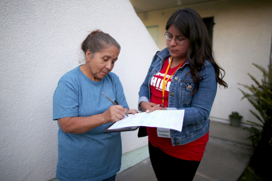 CHIRLA volunteer Diana Ramos registers Esperanza Artiga who emigrated to the U.S. from El Salvador 45 years ago, to vote in the U.S. presidential election in Los Angeles
