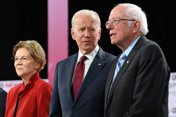 Democratic presidential hopefuls, from left, Massachusetts Sen. Elizabeth Warren, former Vice President Joe Biden and Vermont Sen. Bernie Sanders arrive ahead of a Democratic primary debate in Los Angeles on Dec. 19, 2019.