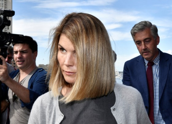 Image: Lori Loughlin leaves federal court after a hearing on charges in a nationwide college admissions cheating scheme in Boston