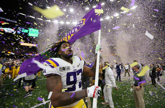 Image: LSU Tigers defensive end Glen Logan (97) celebrates after the LSU Tigers defeated the Clemson Tigers in the College Football Playoff national championship game at Mercedes-Benz Superdome