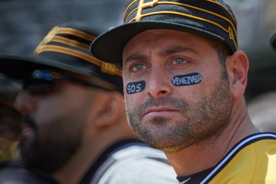 Venezuelan catcher Francisco Cervelli wears a message of support for his home country in his eye black during a game in 2017.