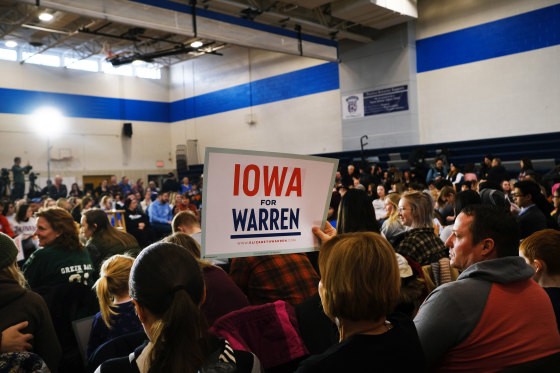 Image: Supporters listen as Democratic presidential candidate Sen. Elizabeth Warren (D-MA) speaks during a town hall event at a school on Jan. 19, 2020 in Des Moines, Iowa.