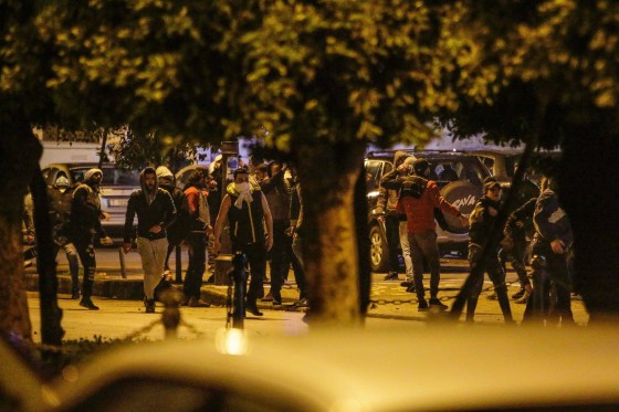 Image: Anti-government protesters clash with the Lebanese army in the coastal city of Tripoli north of Beirut