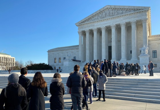 Image: People line up outside the Supreme Court ahead of oral arguments in a case from Montana on religious rights and school choice