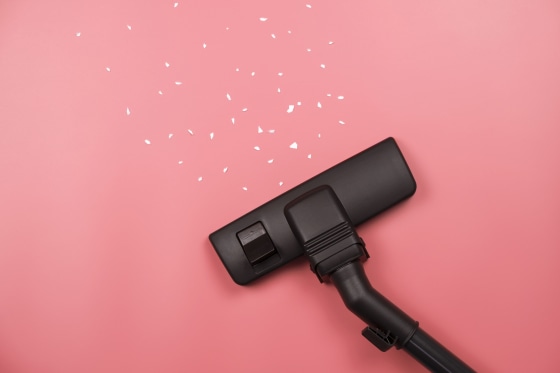 Close-Up Of Vacuum Cleaner On Pink Background