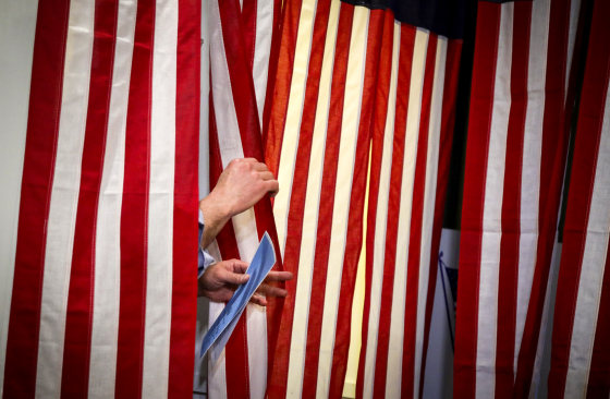 Image: Joe Casey exits a voting booth at the first-in-the-nation midnight voting tradition at Dixville Notch, N.H., on Feb. 11, 2020.