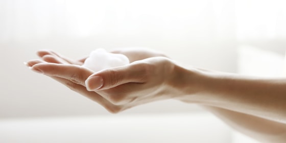 Face-wash foam on hands