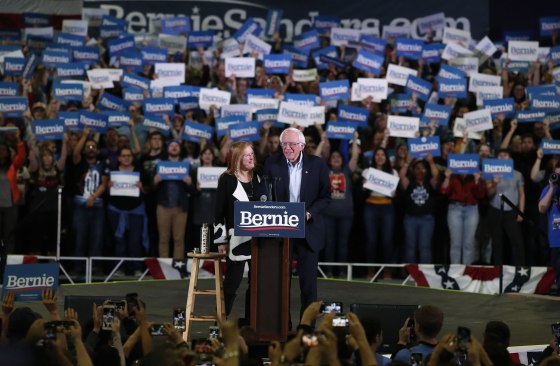 Image: Democratic presidential candidate Sen. Bernie Sanders, I-Vt., jokes with his wife, Jane, during a campaign stop late Sunday, Feb. 16, 2020, in Denver.