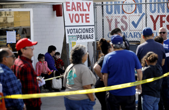 Image: People wait in line to vote early in Las Vegas on Feb. 17, 2020.