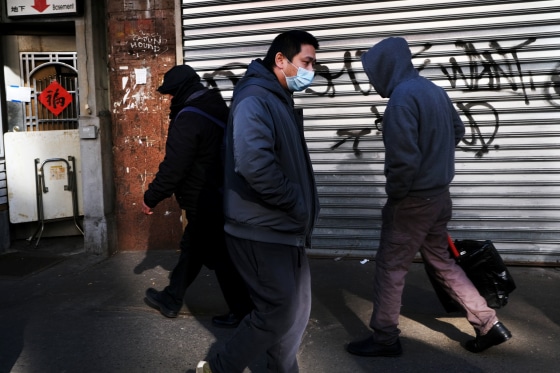 Image: People wear masks to protect against the coronavirus in New York on Jan. 29, 2020.