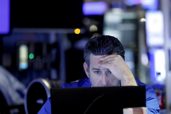 Image: A trader works the floor at the New York Stock Exchange on Feb. 18, 2020.
