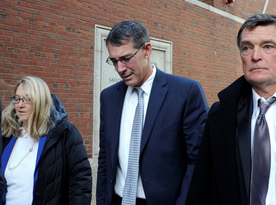 Image: Center leaves the federal courthouse in Boston