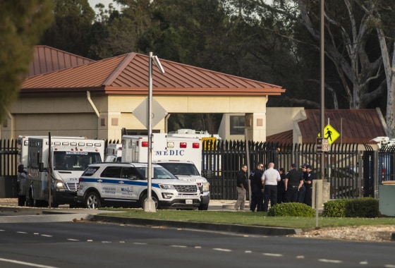 Image: A group of ambulances from the Solano EMS Cooperative stage at the visitor center at Travis Air Force Base, adjacent to Fairfield
