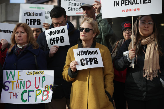 Image: Supporters of the Consumer Financial Protection Bureau outside the agency