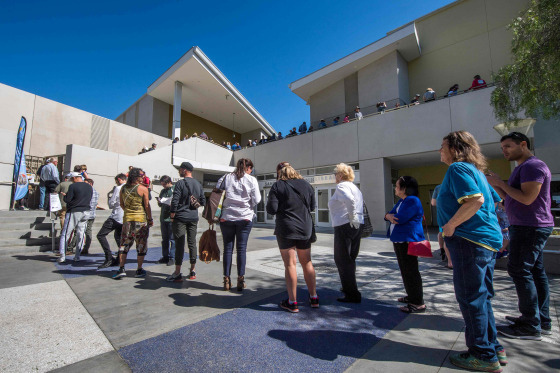 Image: People wait to vote in the presidential primary at Santa Monica Public Library in Calif., on March 3, 2020.