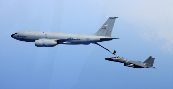 The U.S. Air Force's KC-135 refueling tanker and a F-15K fighter of South Korea's Air Force participate in a drill of aerial refueling