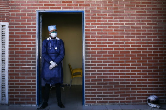 Image: A doctor wears a face mask at the Ana Francisca Perez de Leon hospital in Caracas