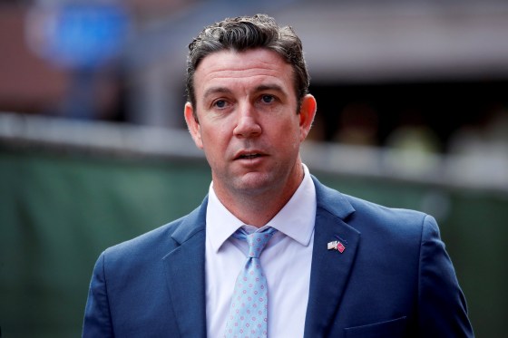 Image: Duncan Hunter leaves federal court after being sentenced to 11 months in prison on a corruption charge in San Diego, Calif., on March 17, 2020.
