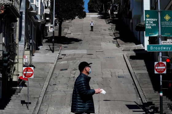 Image: People walk on the streets in San Francisco
