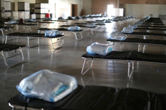 Image: A federal medical station for up to 125 coronavirus disease (COVID-19) patients is set up to ease strain at county hospitals, in Indio, California