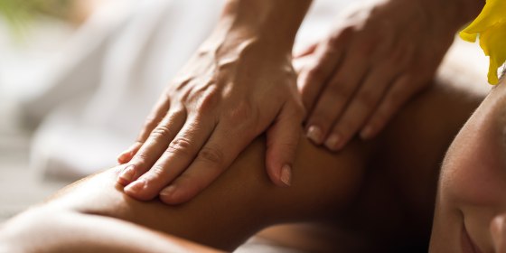 Close up of receiving relaxing massage at the spa.