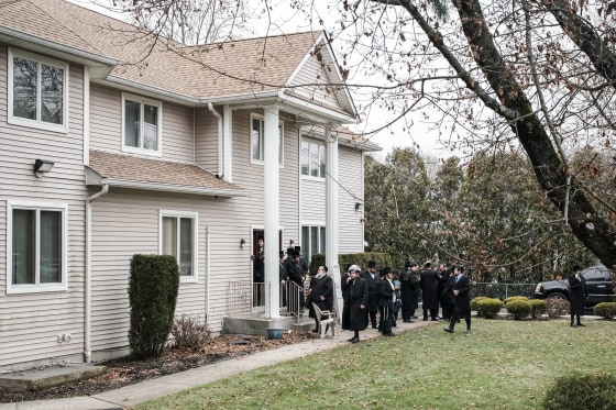 People gather at Rabbi Chaim Rottenberg's residence in Monsey, New York, on Dec. 29, 2019.