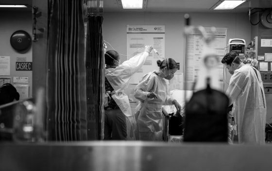 Image: A patient is treated aboard the USNS Mercy hospital ship in Los Angeles on March 29, 2020.