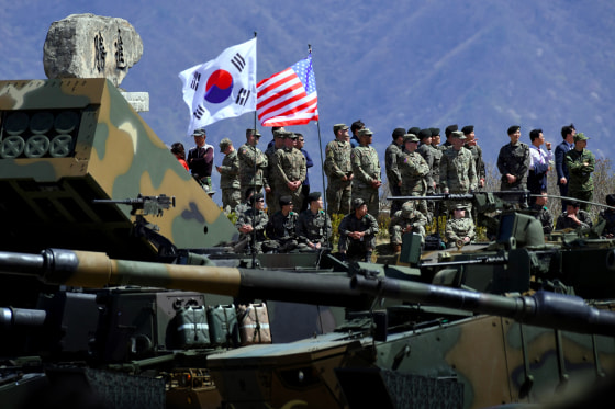 Image: U.S. and South Korean soldiers watch a drill at the Seungjin Fire Training Field near Seoul in 2017.