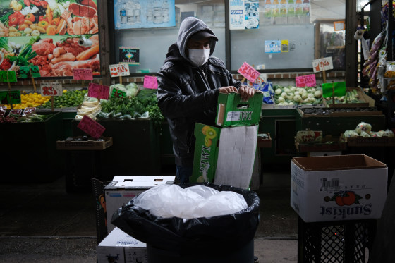 Image: Grocery store worker in Brooklyn